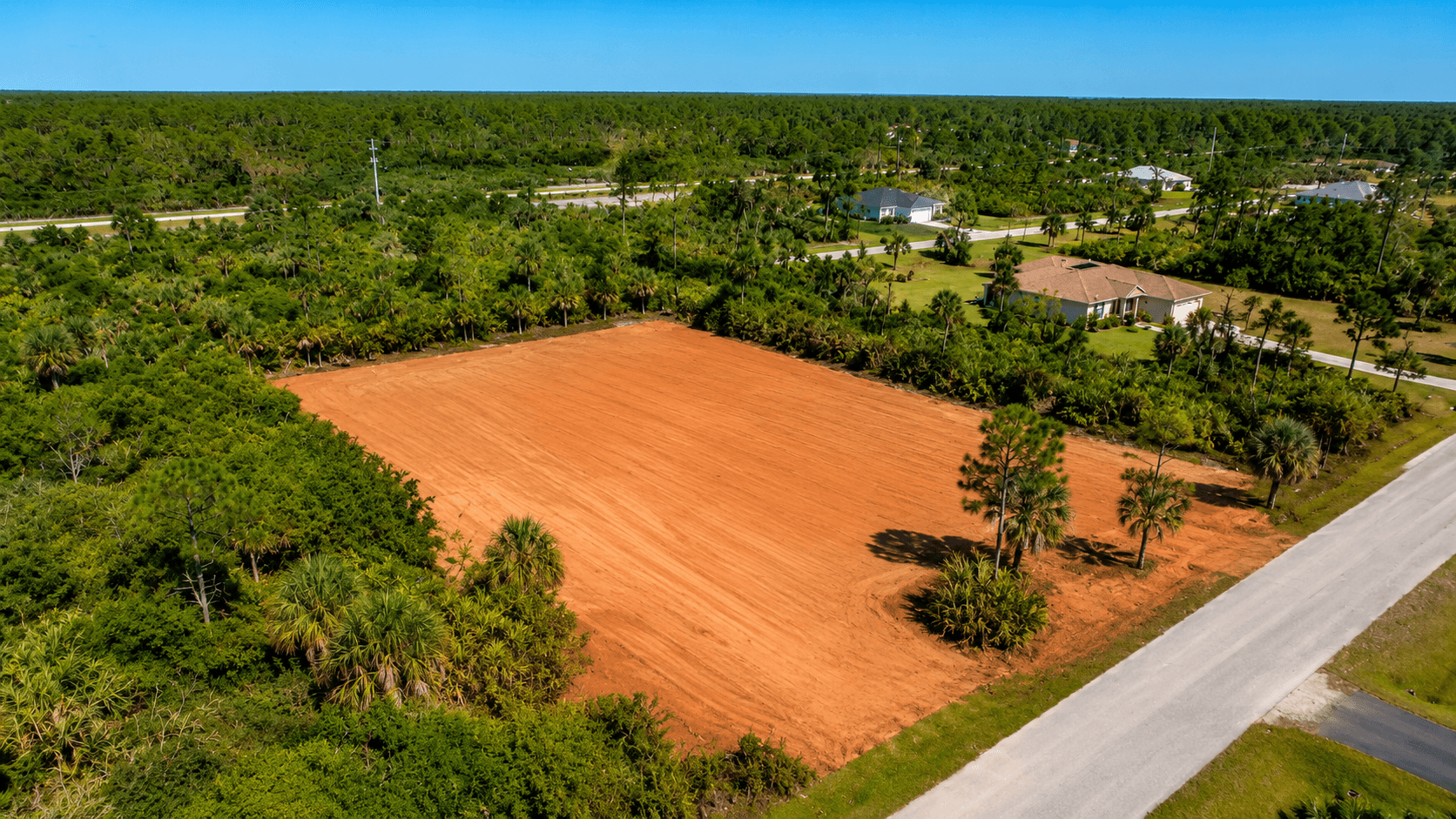 Double-wide manufactured home being set up on a Florida lot